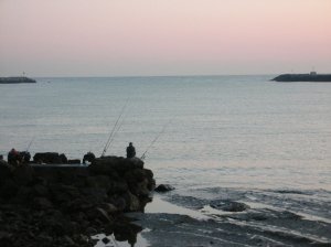 Fishermen at dusk