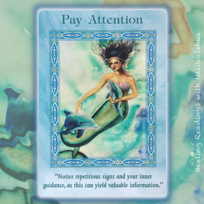 A mermaid swimming with a dolphin around her tail - Pay Attention from the Magical Mermaids & Dolphins oracle cards